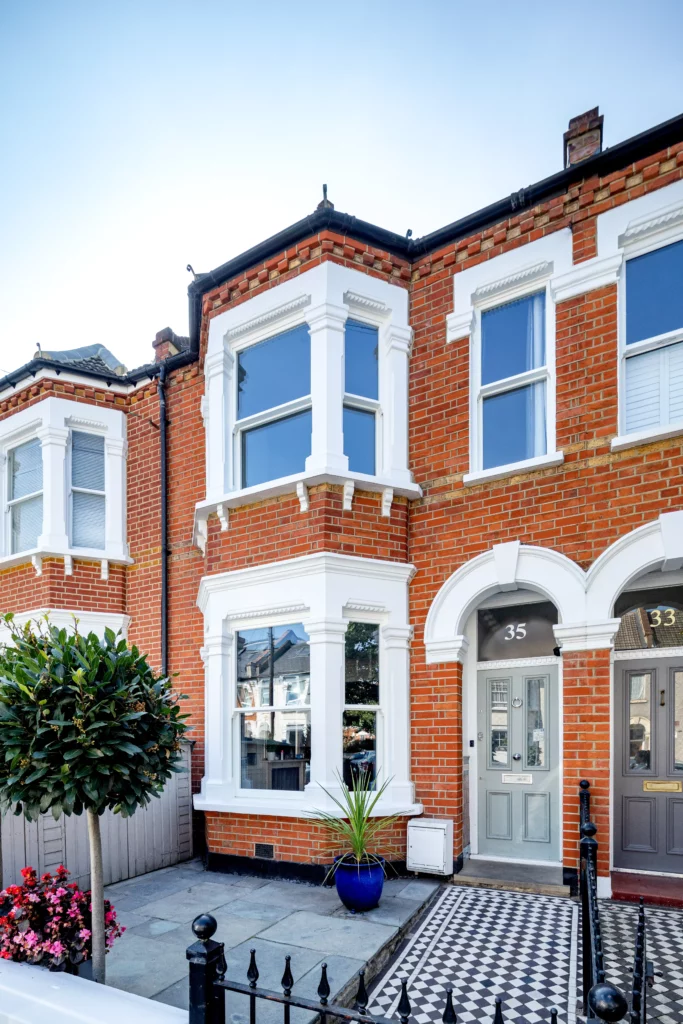 sash windows on red brick house