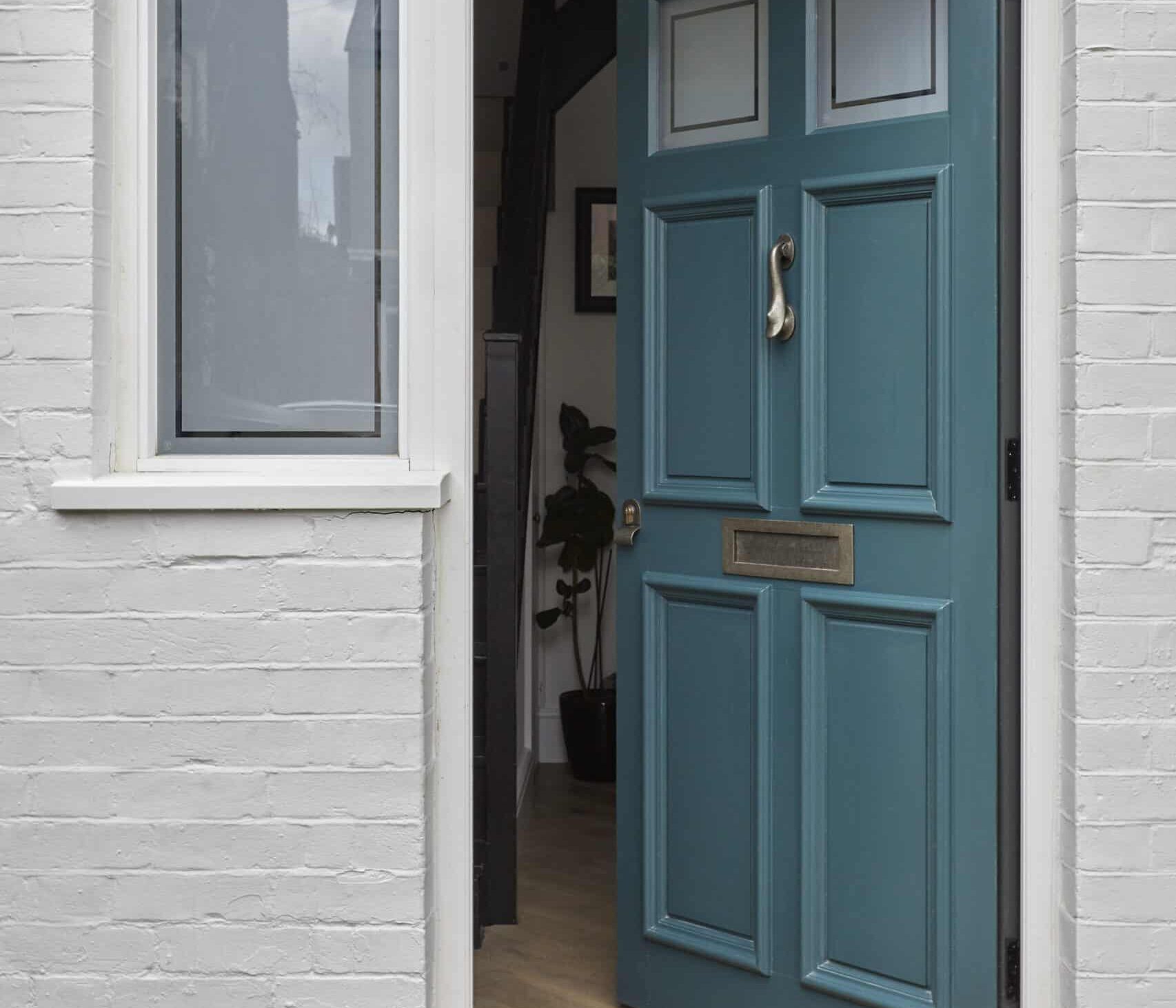 teal timber front door