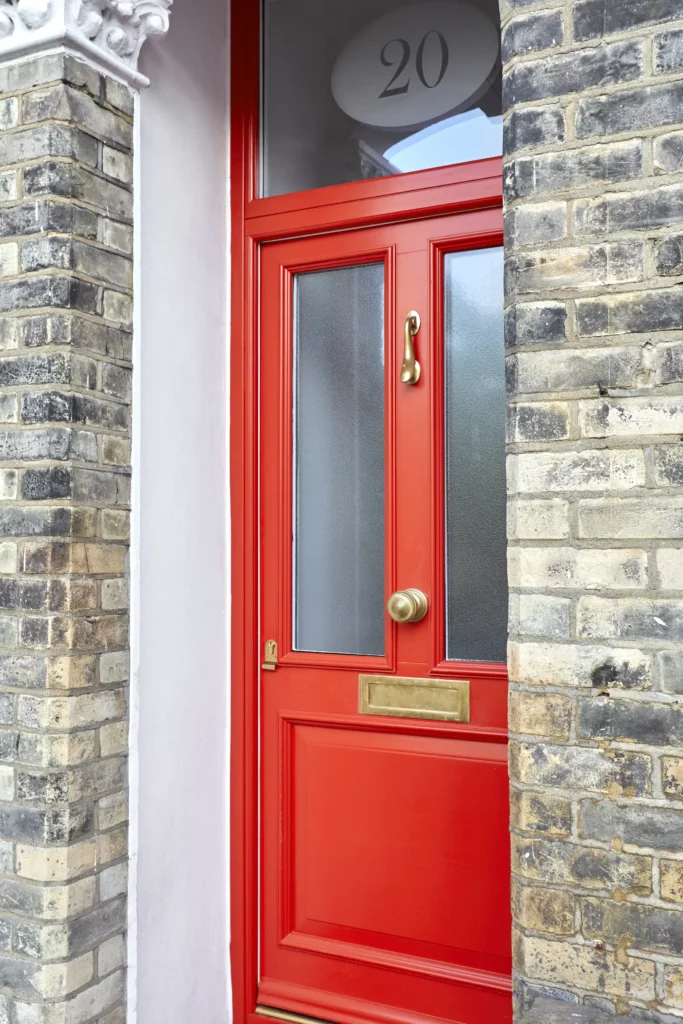 red traditional timber front door